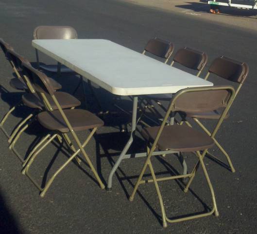 6' party table and 8 chocolate brown folding chairs